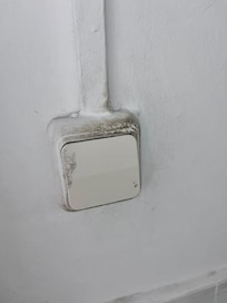 Light switch in the common bathroom
