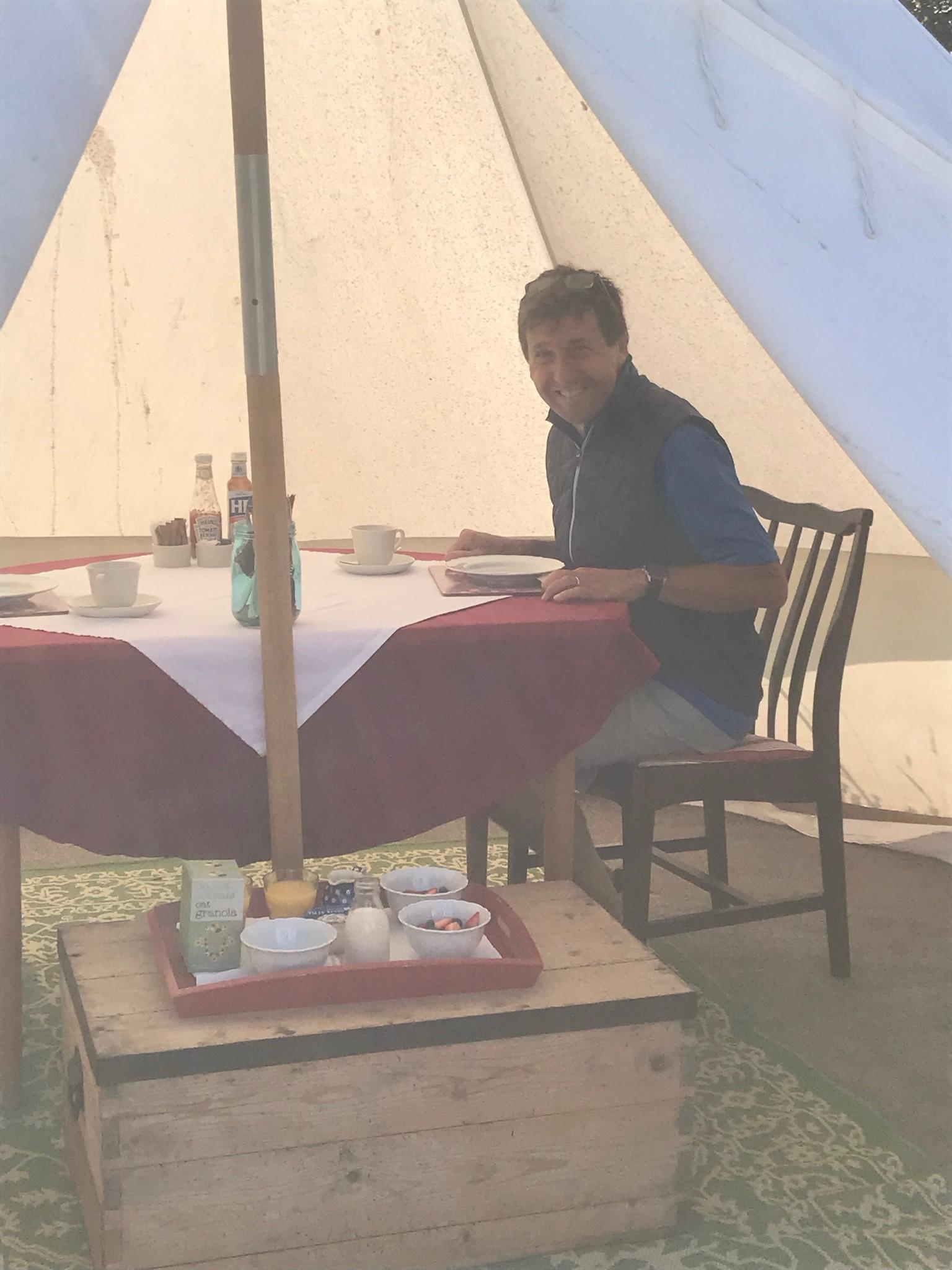 Enjoying breakfast outside in the teepee.