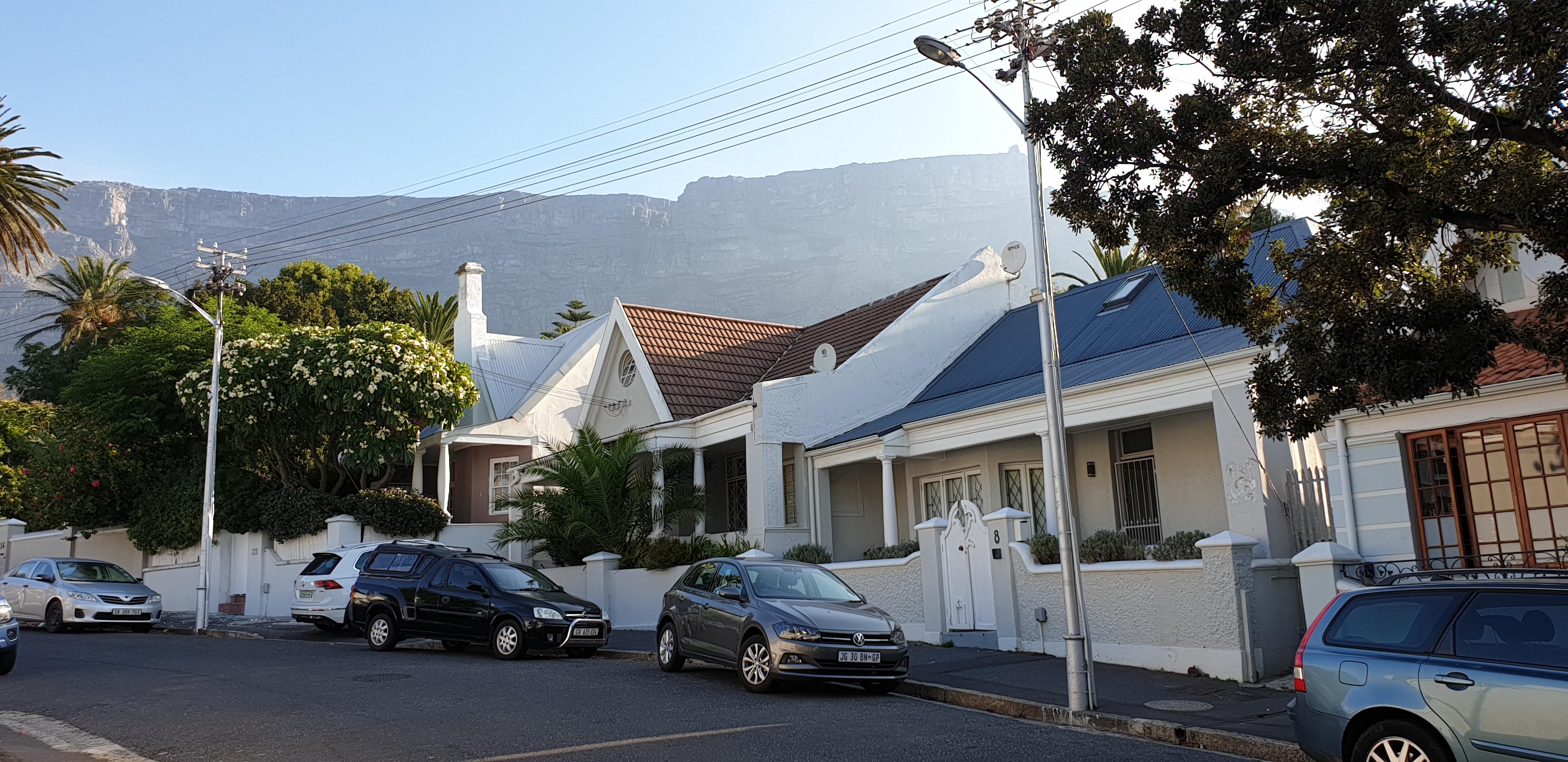 Street outside hotel entrance with Table Mountain view