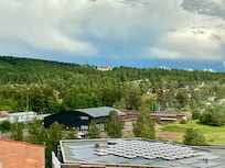 Rolling hills and trees and clouds