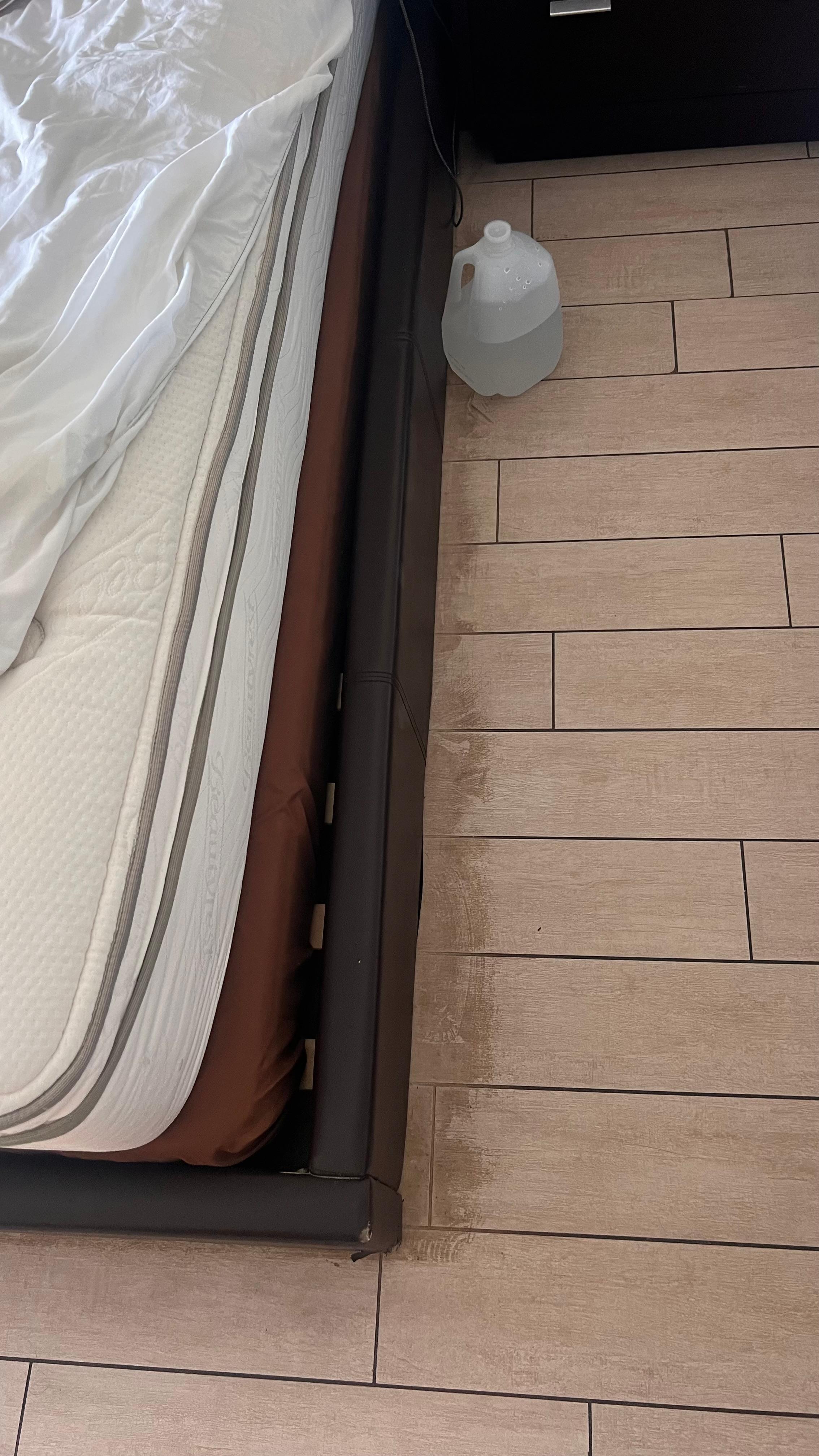 Dirt on floor around  bed, sheets could not go all the way over the mattress 