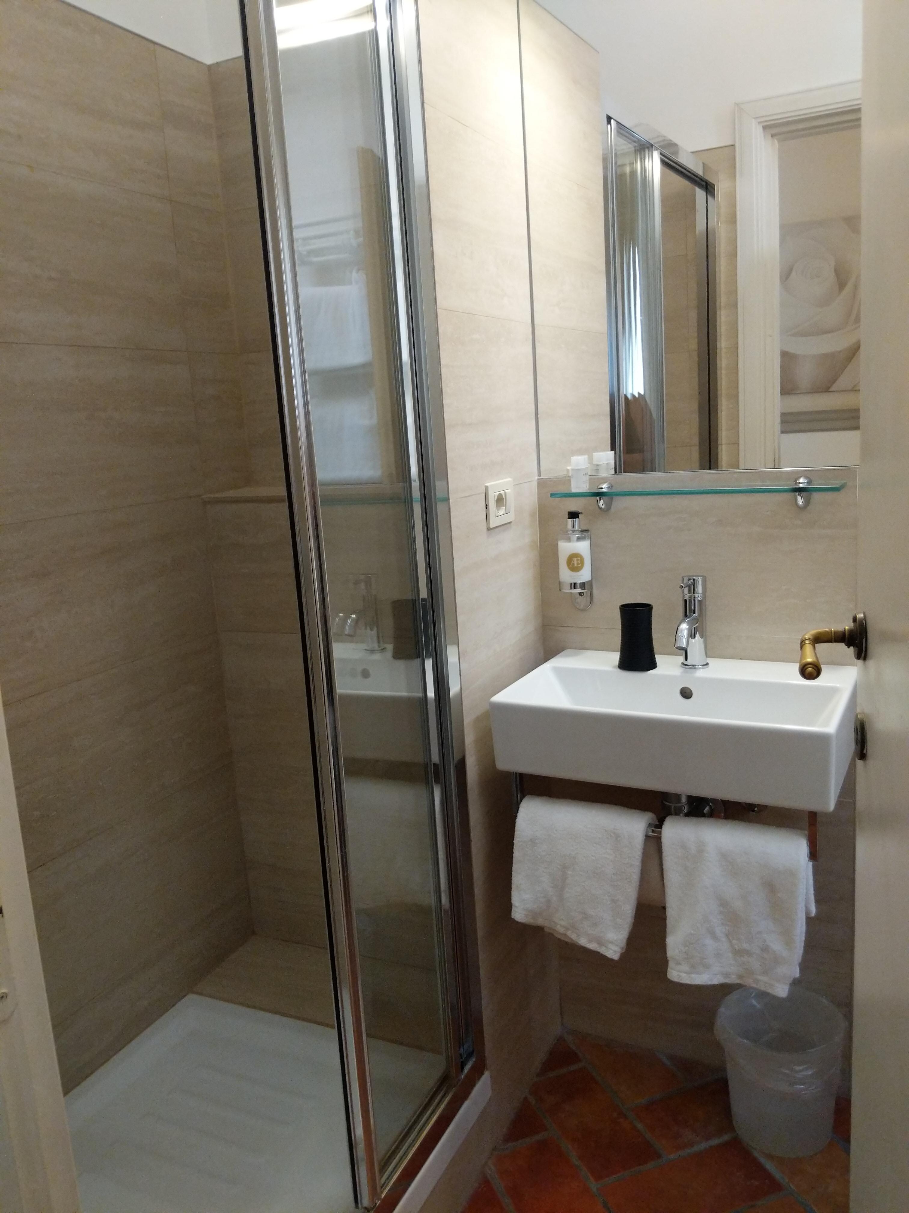 Very clean bathroom with spacious shower.