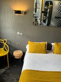 Our room with wine cork nightstand