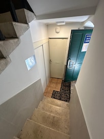 The ground floor is shared wit a pizzeria