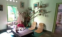 enjoying breakfast in the relacing sitting area inside the house