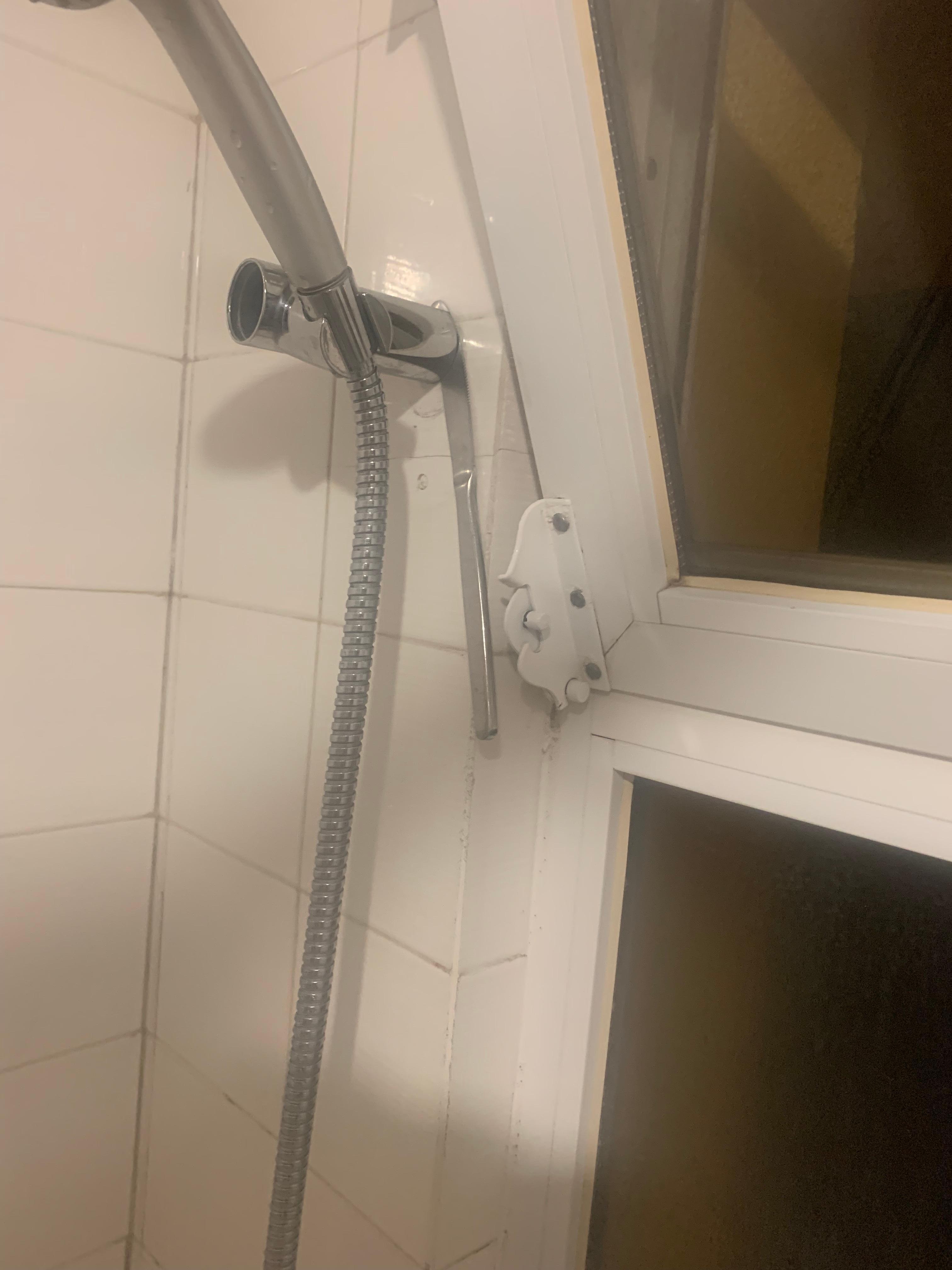 Knife stuck into shower fitting