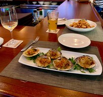 Apps at the bar, clams casino and fried calamari