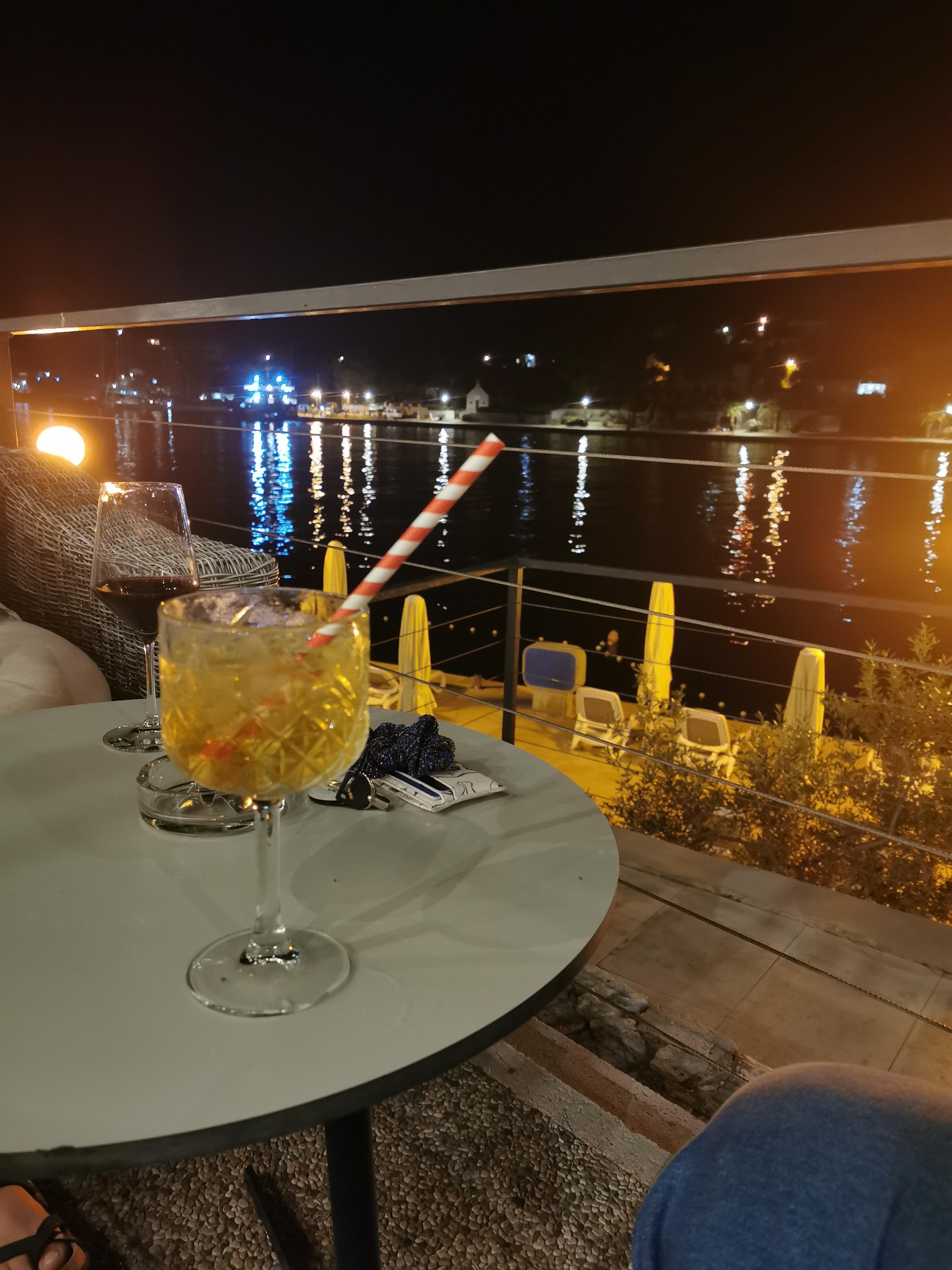 From the terrace at night watching the boats. 