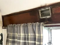 Covered in mold, this is the window next to the bed.