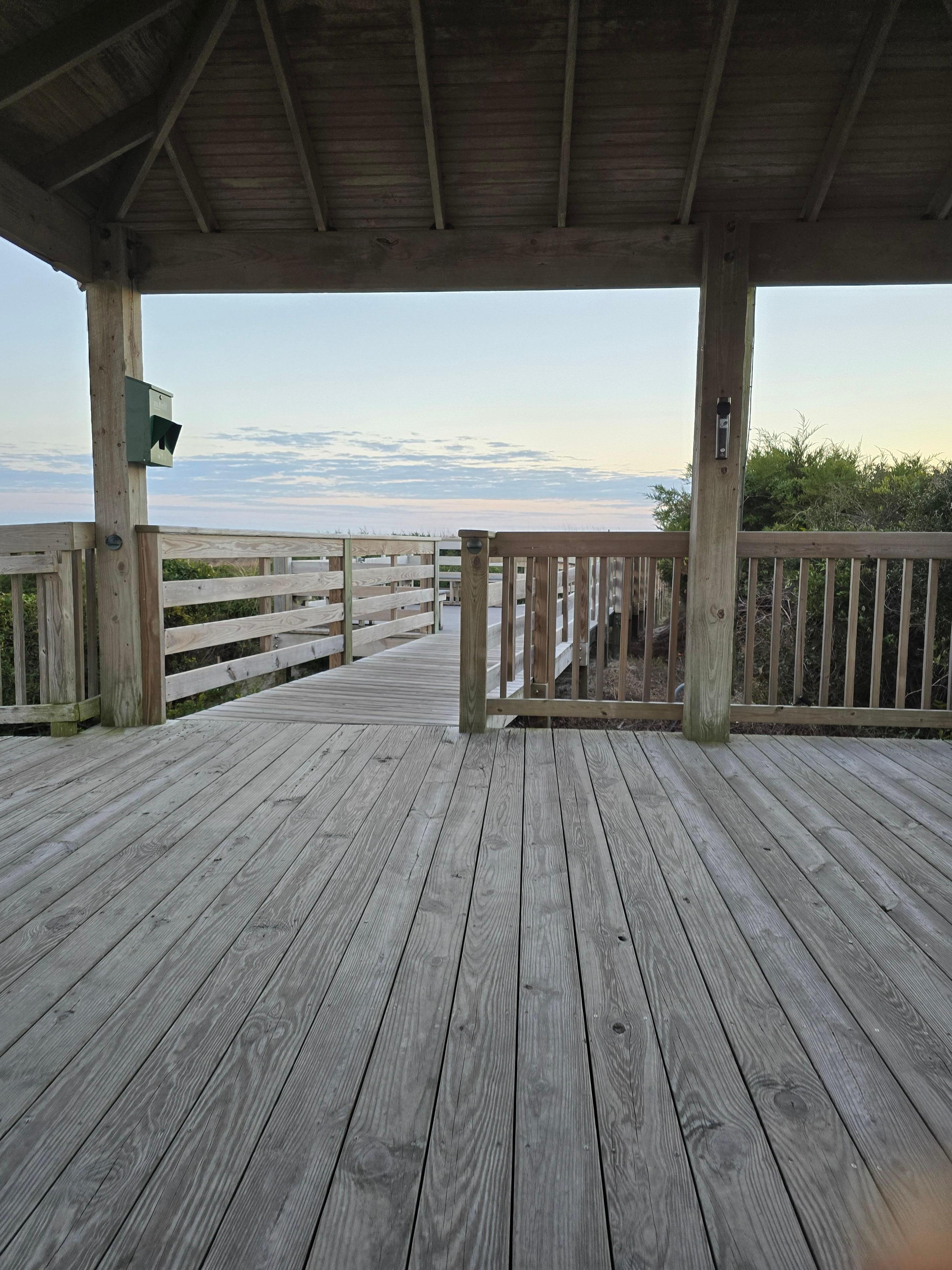 View looking out towards the ocean from swing in the gazebo.