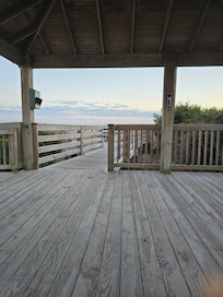 View looking out towards the ocean from swing in the gazebo.