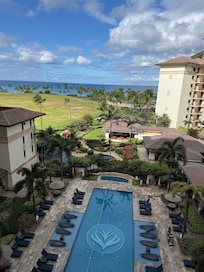 The view from the balcony! The property stretches down to the peaceful, sheltered ocean lagoon.