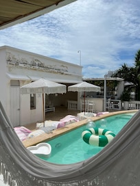 Rooftop pool and lounge space