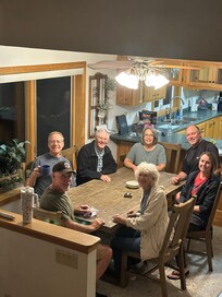 A lively game of Uno fueled by bowls of Wisconsin cheese curds:)
