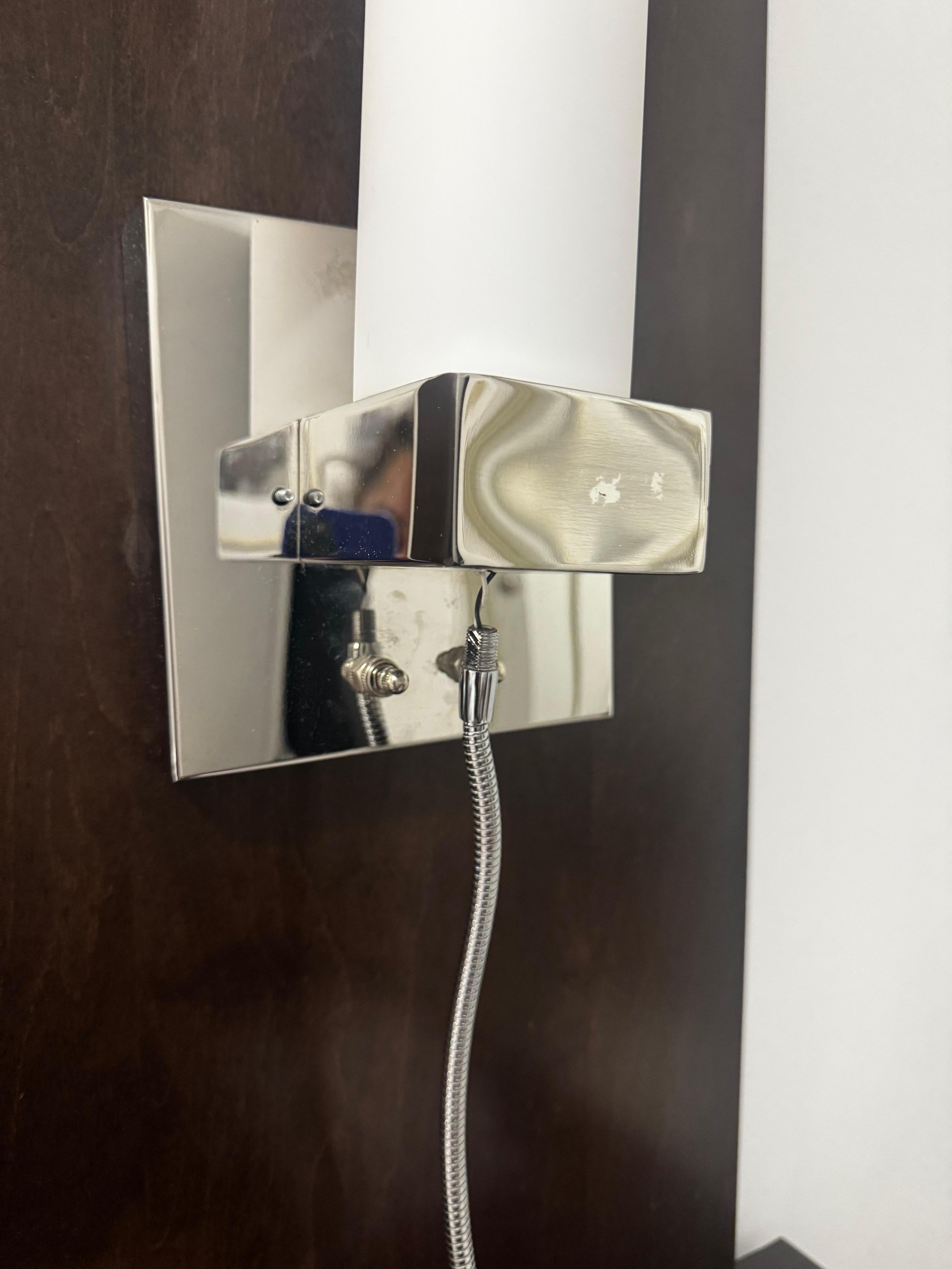 Bedside lamp hanging apart.