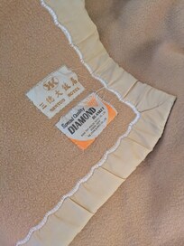 毛布を掛けてもなお寒い客室