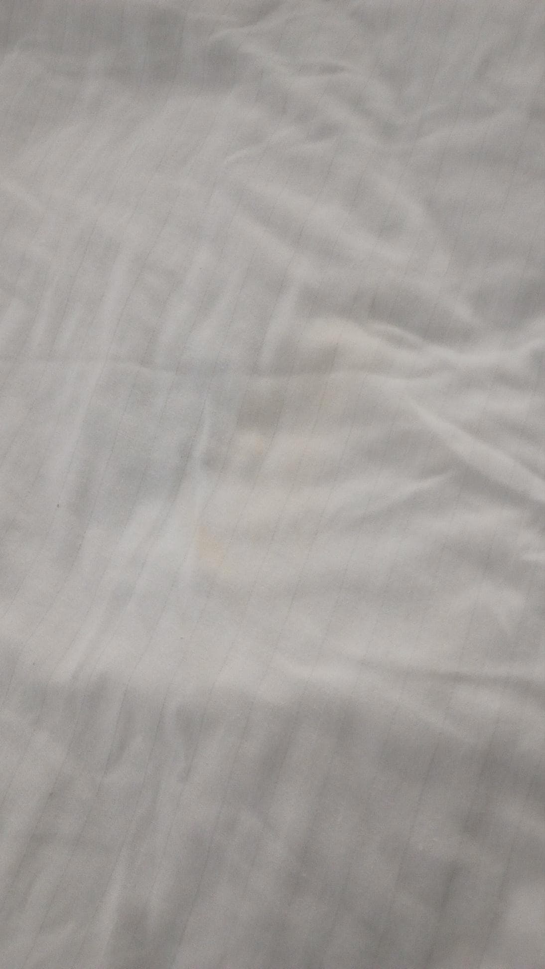 Yellow stain on sheet