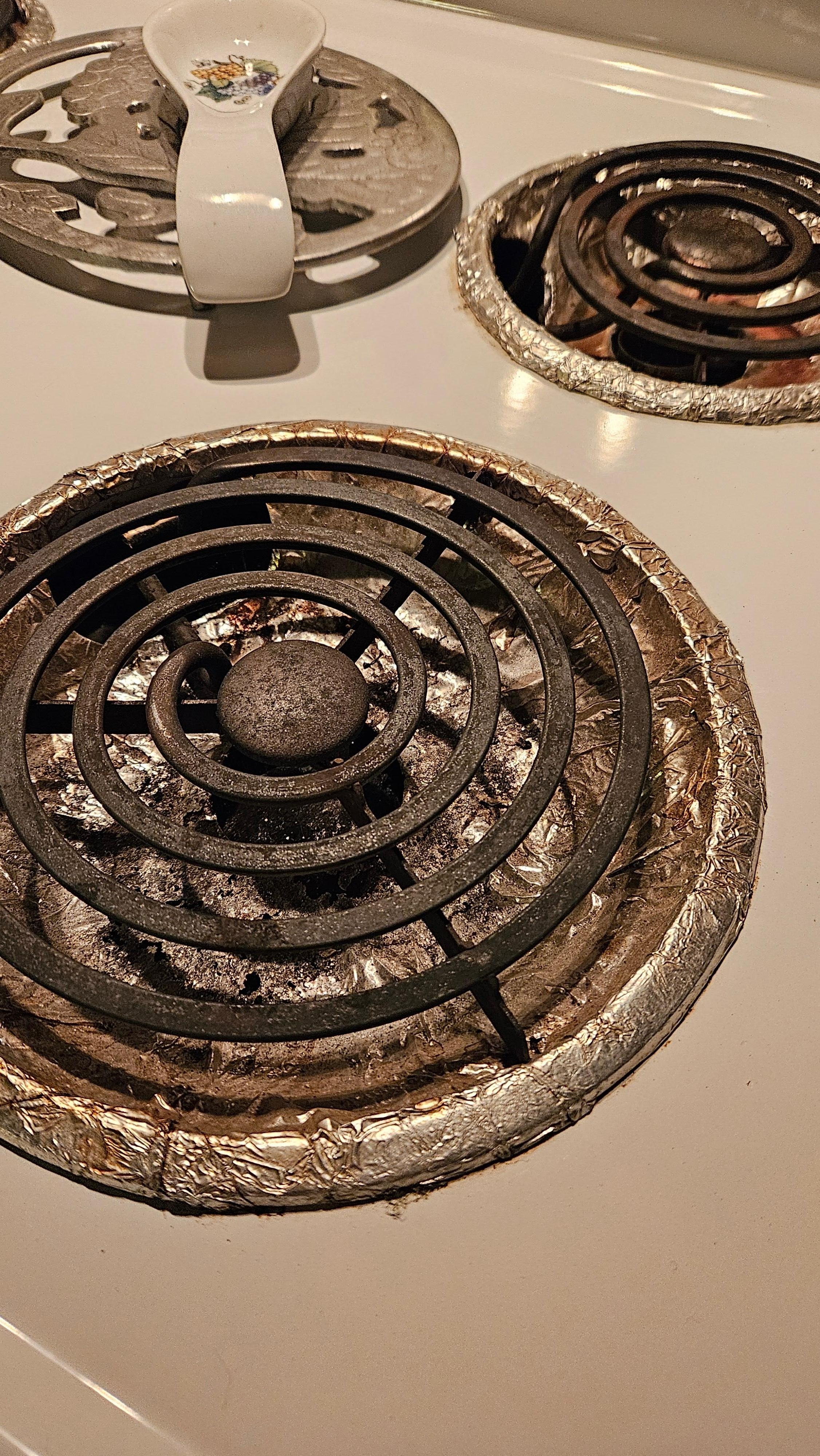 basement kitchen.  we didn't need it, but I wouldn't have cooked on that. shouldn't have been difficult to change the foil for a more welcome feel