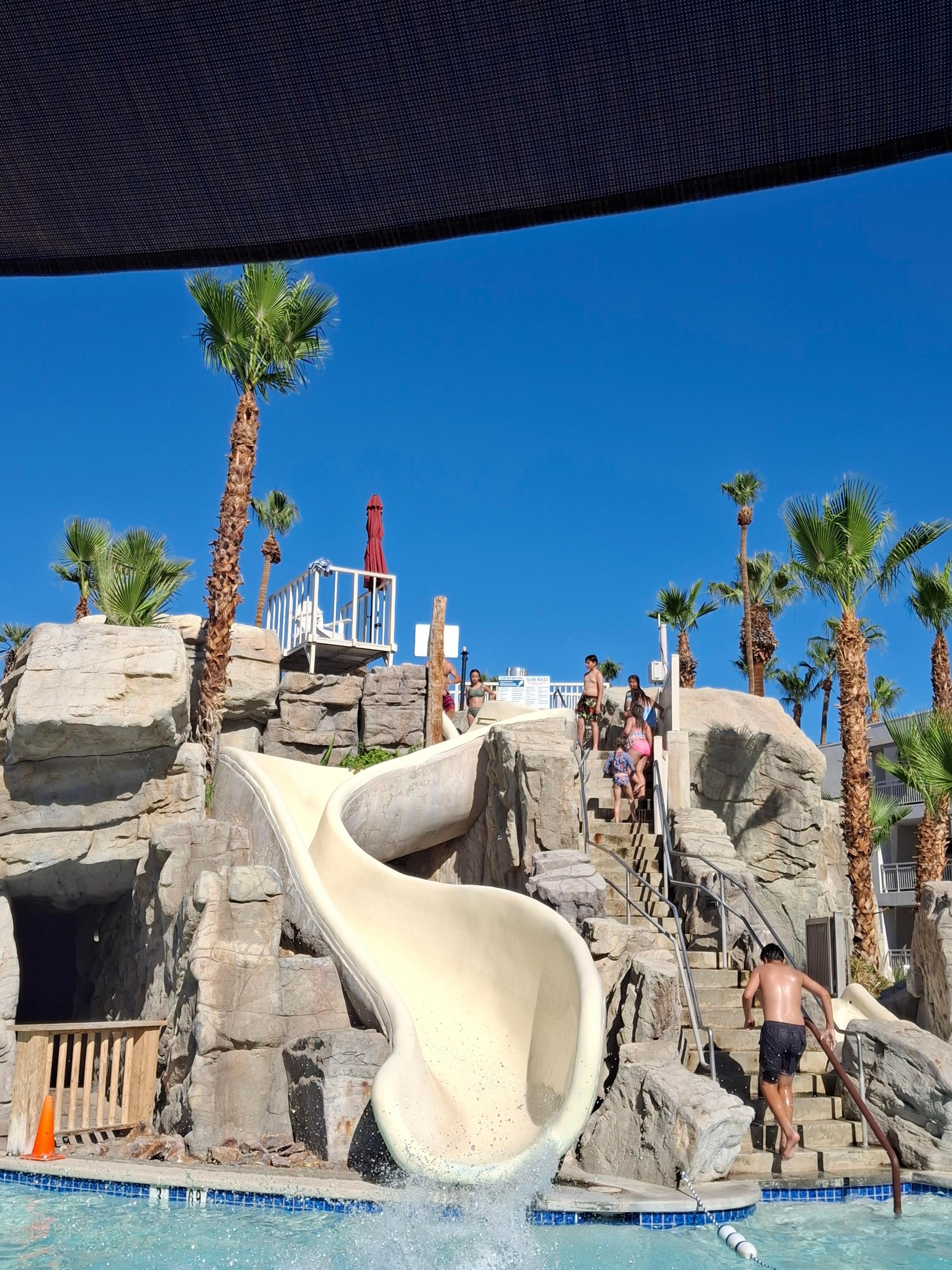 Fun slide into.pool!
