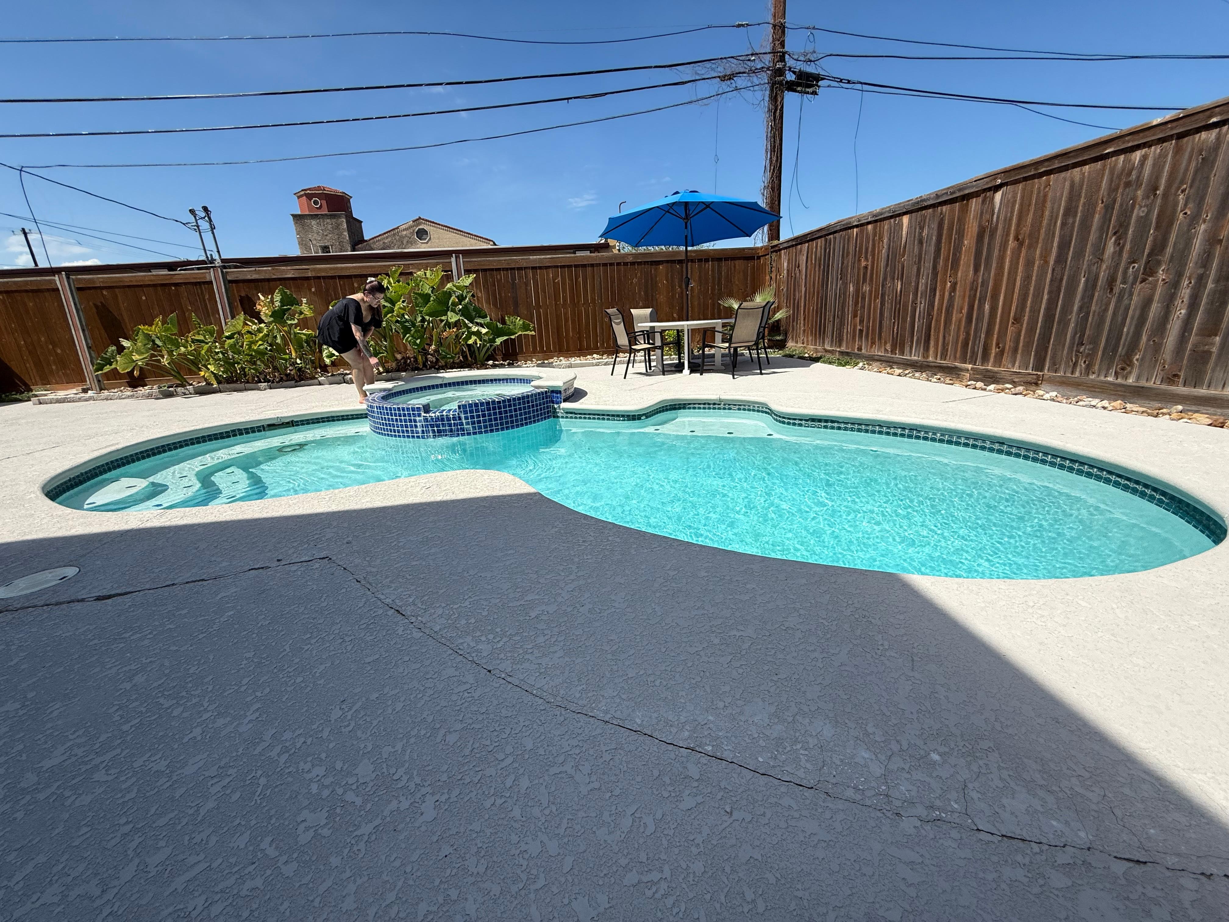 The outdoor pool/patio area