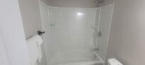 No shower curtain