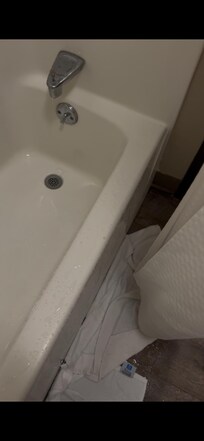 The shower design in my room was very inconvenient. There was no liner inside the shower, and the round shower curtain rod caused water to spill out onto the floor. To make matters worse, there was no floor mat provided, so I had to use towels.