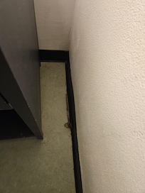 The coner of night stand.