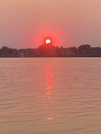 Watching sunset on the dock at Hotel