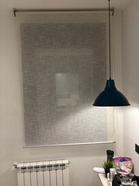 Window treatments in bedroom that do not offer privacy or block light.