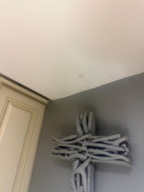 Food splattered on the ceiling near kitchen.