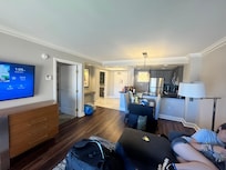 Living room, dining area and kitchen