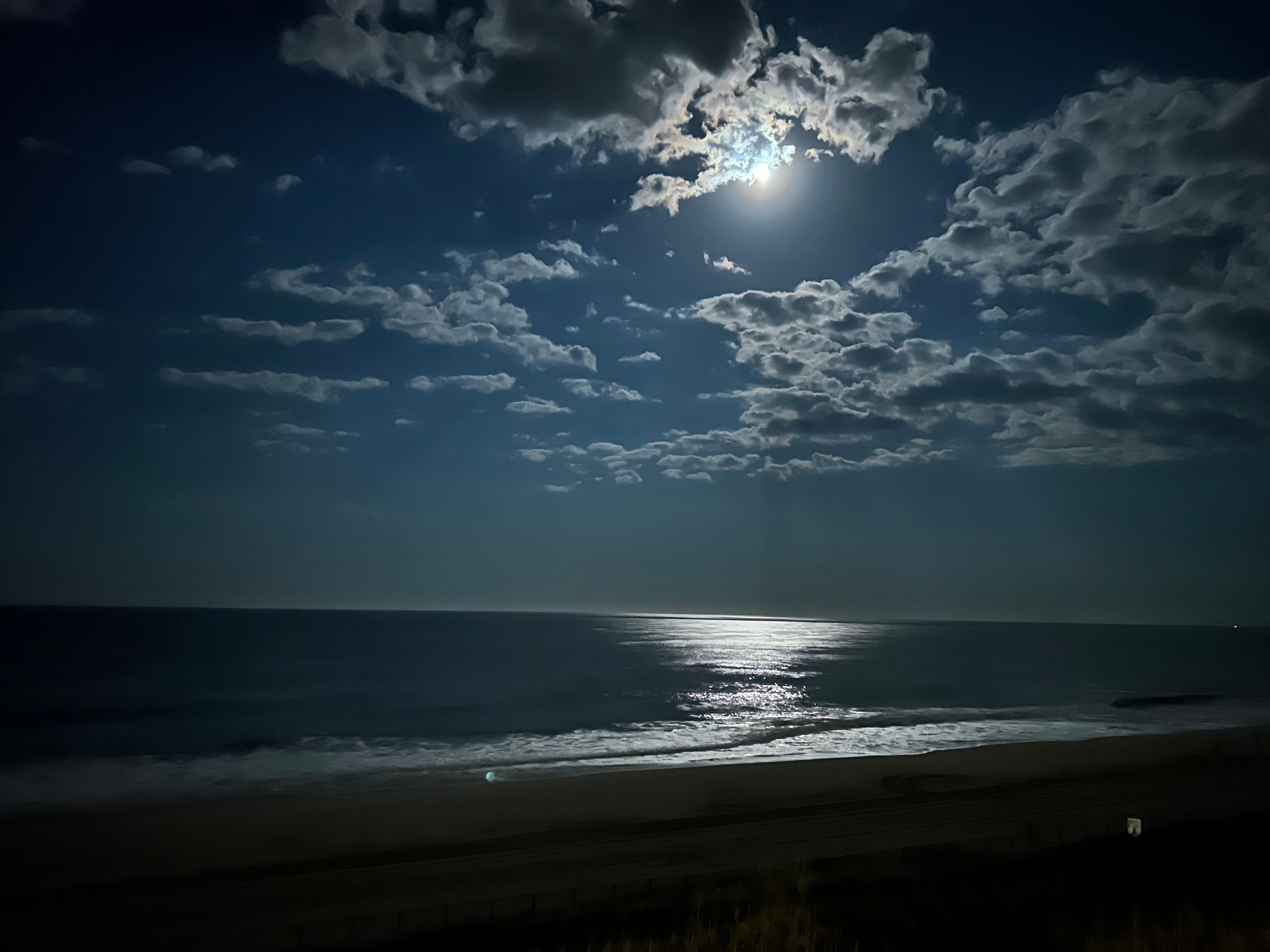 Moon over ocean from balcony