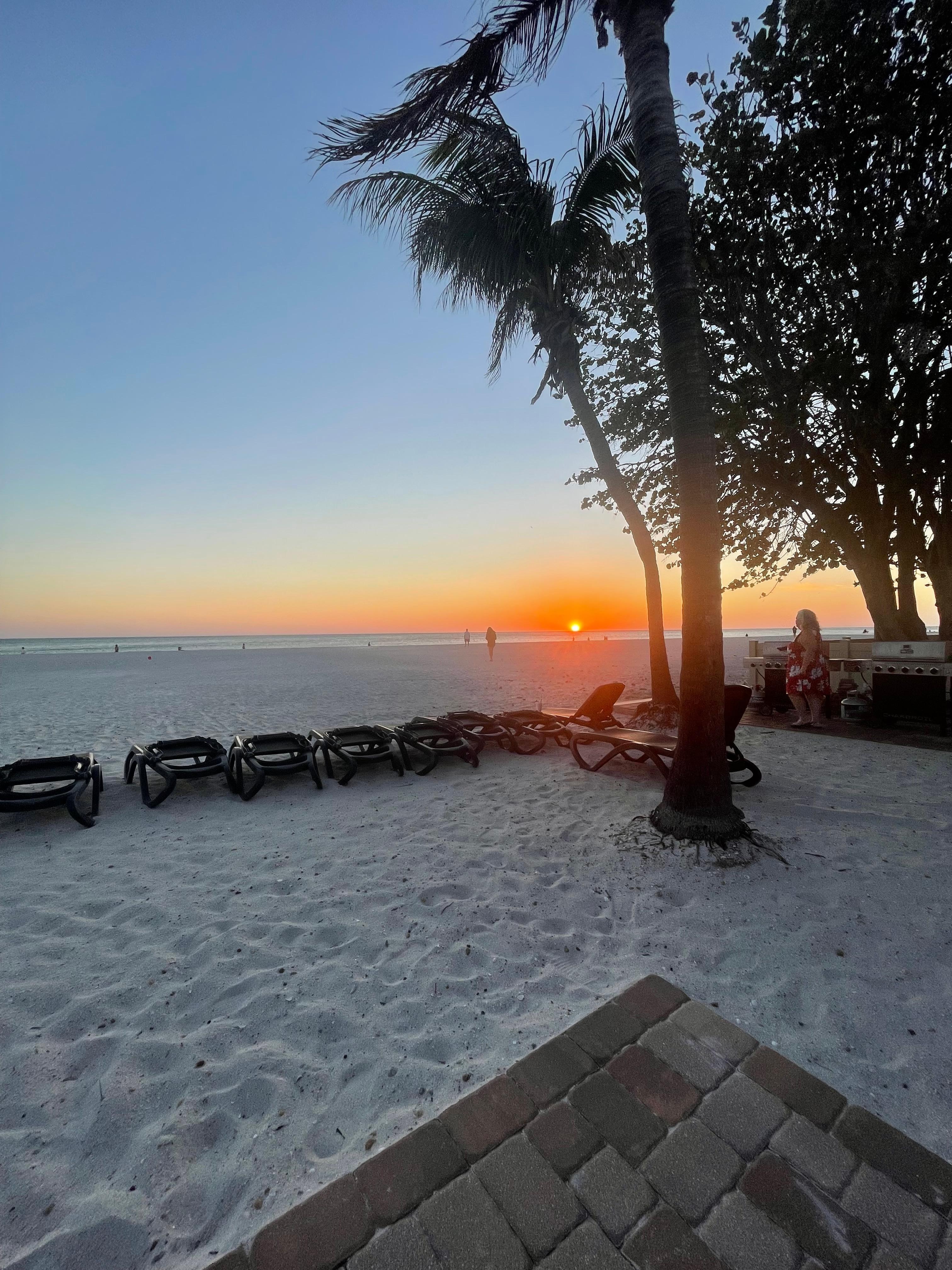 Watching the sunset from the picnic table on the patio. 