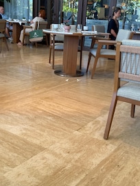 Too many staff members were idly standing around, gazing upward, instead of cleaning. It’s glaringly obvious—how can they repeatedly ignore this food on the floor for almost an hour?