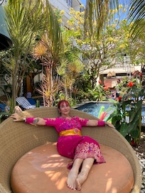 It would have been rude not to try out the lounging chair by the pool bar, and to enjoy a Balinese dress experience.
