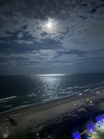 A view of the beach from the hotel at night.
