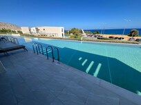 View from our room, swim up suite sea view, there was sun on our sunbeds in the morning until about 2