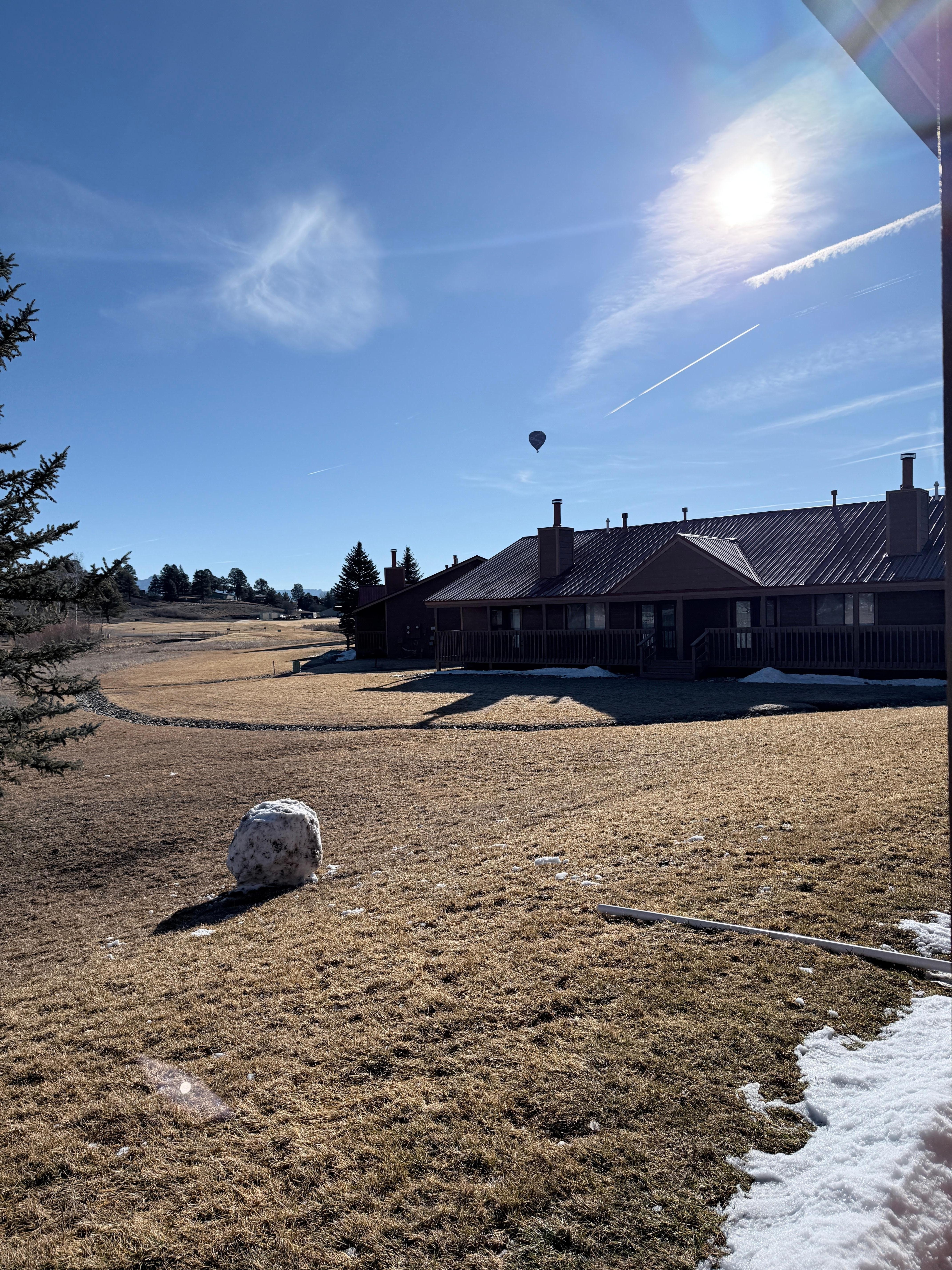 View of the back of the condo, plus the large snowball my boys made!