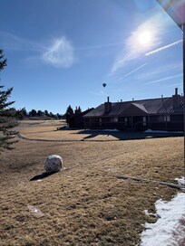 View of the back of the condo, plus the large snowball my boys made!