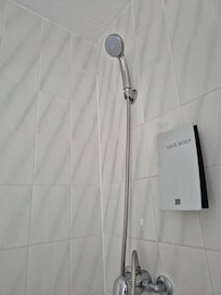 Shower attached to the wall