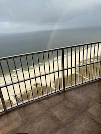 Rainbow touching the beach