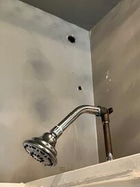 Holes in bathroom