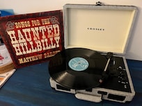 Autographed records from Canadian artists.