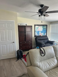 The partially blocked (door opening into apartment) door by armoire to the owners apartment (not disclosed)