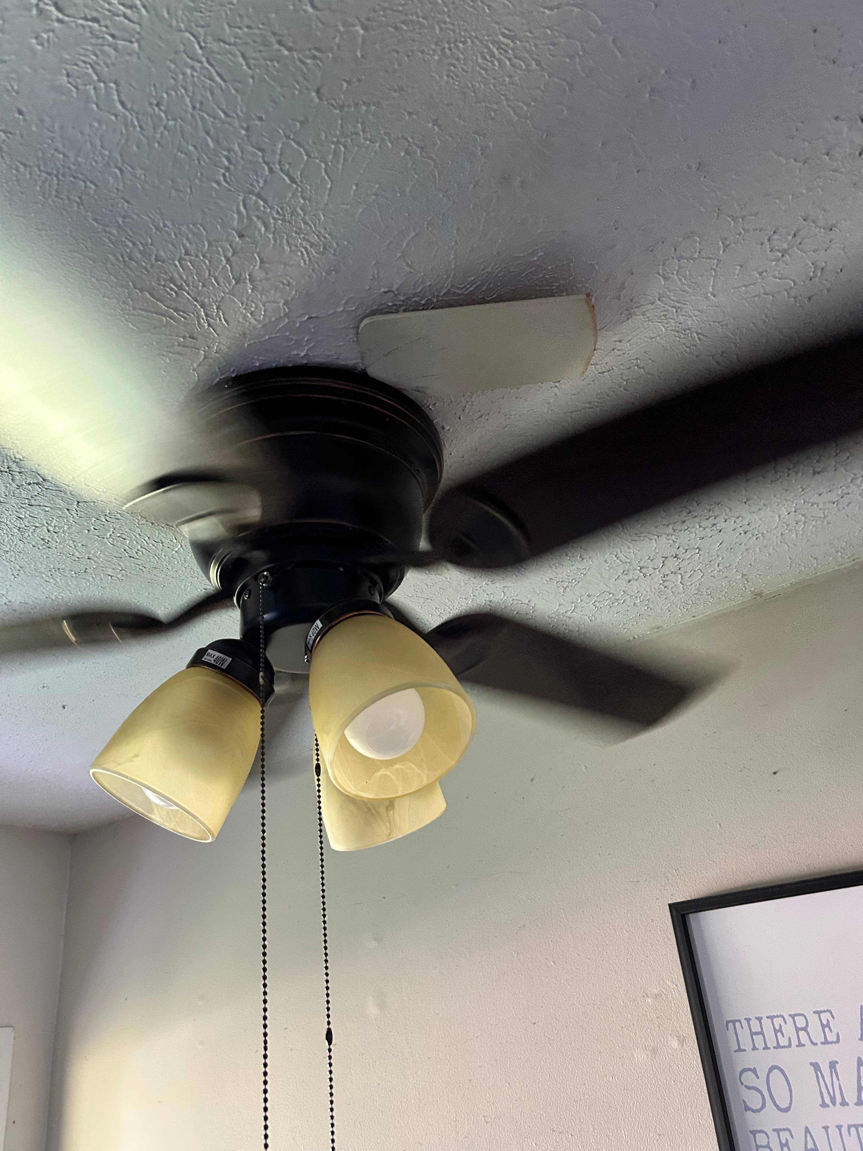 The ceiling fan looked like it would fall from the ceiling if this piece of wood wasn’t there.