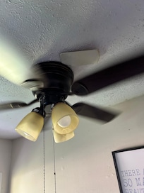 The ceiling fan looked like it would fall from the ceiling if this piece of wood wasn’t there.