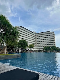 The hotel block pictured from the pool.
