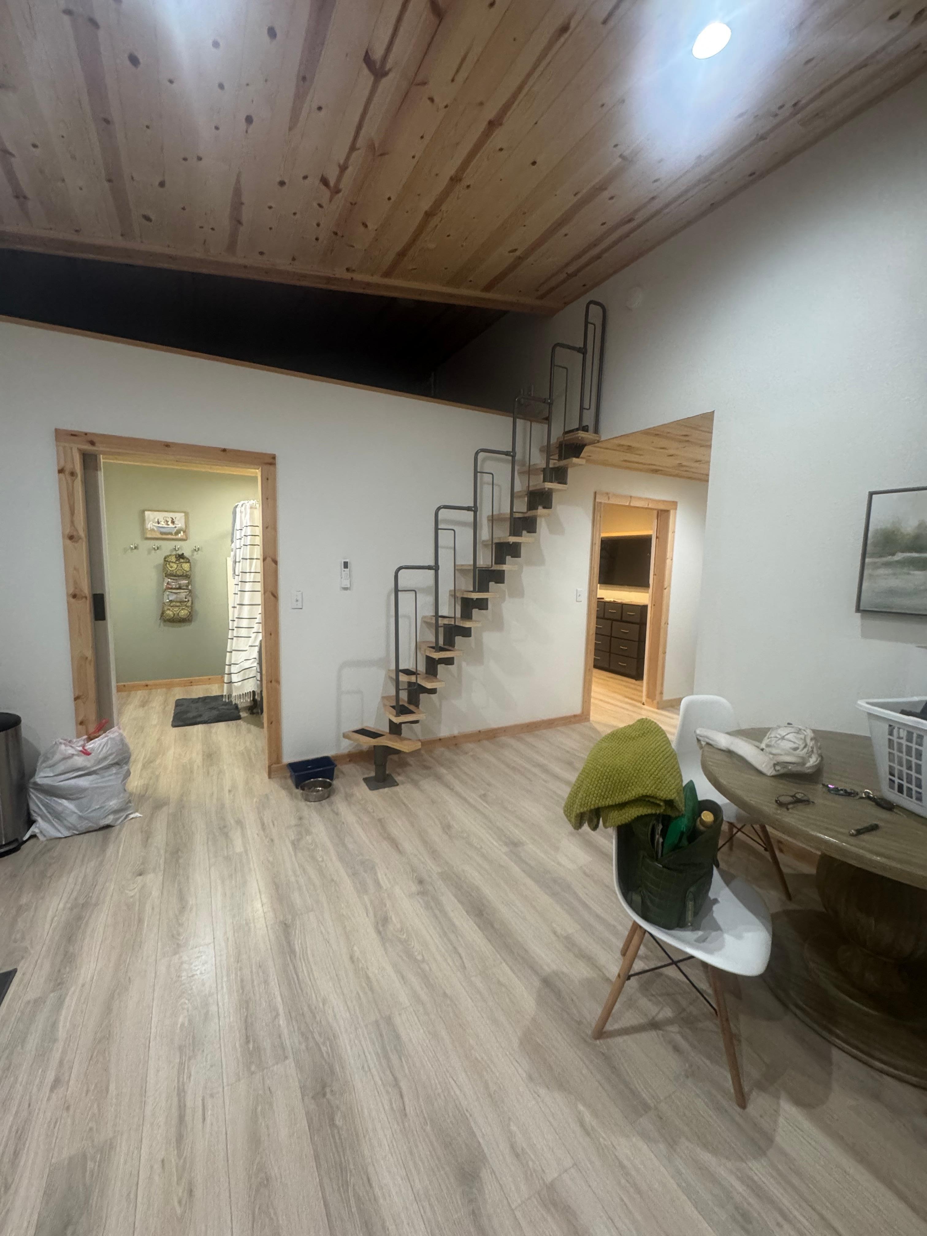 Living/stairway to loft- super cute! 