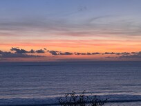 Sunset at the beach across the street
