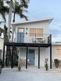 Room 106 on top floor facing street.